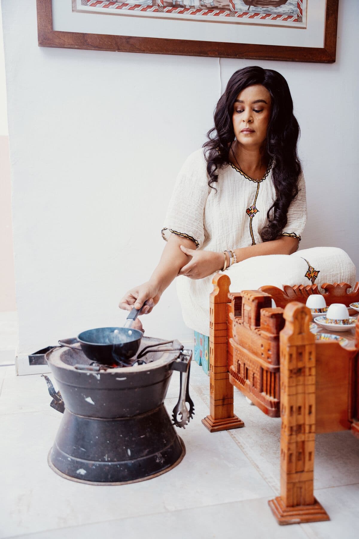Coffee roasting in the lounge next to the rekebot at Ge'eza